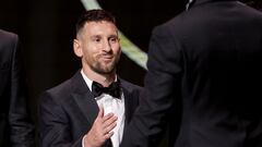 Inter Miami CF's Argentine forward Lionel Messi gestures on stage during the 2023 Ballon d'Or France Football award ceremony at the Theatre du Chatelet in Paris on October 30, 2023. (Photo by FRANCK FIFE / AFP)