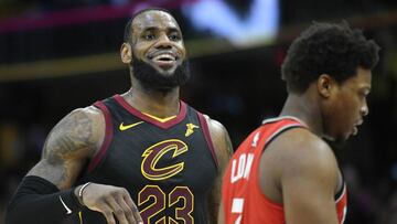 May 7, 2018; Cleveland, OH, USA; Cleveland Cavaliers forward LeBron James (23) reacts beside Toronto Raptors guard Kyle Lowry (7) in the third quarter in game four of the second round of the 2018 NBA Playoffs at Quicken Loans Arena. Mandatory Credit: David Richard-USA TODAY Sports