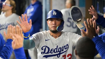 Sep 30, 2025; Los Angeles, California, USA; Los Angeles Dodgers second baseman Miguel Rojas (72) celebrates after scoring a run during the seventh inning against the Cincinnati Reds during game one of the Wildcard round for the 2025 MLB playoffs at Dodger Stadium. Mandatory Credit: Jayne Kamin-Oncea-Imagn Images