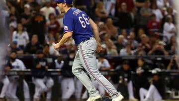 Nov 1, 2023; Phoenix, Arizona, USA; Texas Rangers relief pitcher Josh Sborz (66) reacts after defeating the Arizona Diamondbacks in game five of the 2023 World Series at Chase Field. Mandatory Credit: Mark J. Rebilas-USA TODAY Sports