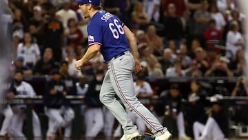 Nov 1, 2023; Phoenix, Arizona, USA; Texas Rangers relief pitcher Josh Sborz (66) reacts after defeating the Arizona Diamondbacks in game five of the 2023 World Series at Chase Field. Mandatory Credit: Mark J. Rebilas-USA TODAY Sports