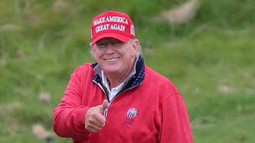 Former U.S. President and Republican presidential candidate Donald Trump gestures as he plays golf at Trump International Golf Links course, in Doonbeg, Ireland May 4, 2023. REUTERS/Damien Storan