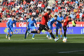 Muriqi pone el esférico en la escuadra derecha donde no pudo llegar Oblak a pesar de adivinar el lugar del lanzamiento del penalti.