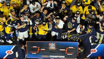 Apr 6, 2026; Indianapolis, IN, USA; The Michigan Wolverines celebrate after their win against the UConn Huskies in the national championship of the Final Four of the men's 2026 NCAA Tournament at Lucas Oil Stadium. Mandatory Credit: James Lang-Imagn Images