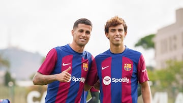 João Cancelo y João Félix, en su presentación con el Barça.