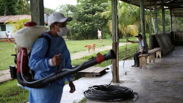A worker disinfects the area before its being set up as a vaccination centre to administer the Pfizer-BioNTech vaccine against the coronavirus disease (COVID-19), in the Santa Maria de Ojial community, in Iquitos, Peru May 15, 2021. Picture taken May 15, 2021.  REUTERS/Liz Tasa  NO RESALES. NO ARCHIVES