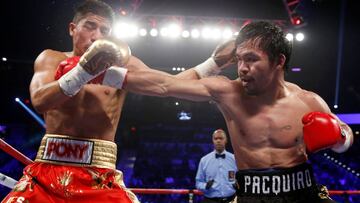 Manny Pacquiao jabs Jessie Vargas in Las Vegas last night.