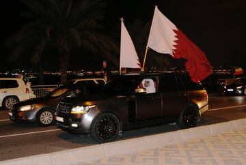 Qatari soccer fans celebrate after winning the AFC Asian Cup, at the Doha Corniche in Doha, Qatar February 1, 2019. 