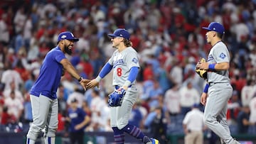 PHILADELPHIA, PENNSYLVANIA - OCTOBER 06: Enrique Hernandez #8, Teoscar Hernandez #37 and Tommy Edman #25 of the Los Angeles Dodgers celebrate on the field after defeating the Philadelphia Phillies in game two of the National League Division Series at Citizens Bank Park on October 06, 2025 in Philadelphia, Pennsylvania. Emilee Chinn/Getty Images/AFP (Photo by Emilee Chinn / GETTY IMAGES NORTH AMERICA / Getty Images via AFP)