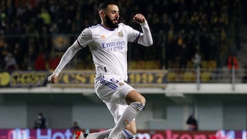 Karim Benzema celebrates scoring Real Madrid&#039;s third goal against Sheriff on Wednesday.