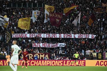 AS Rome's fans display a banner reading "Whoever defends the colours of Rome is our ally. Go Mourinho !" in support of AS Roma's Portuguese coach Jose Mourinho, during the Italian Serie A football match between AS Rome and Sassuolo on March 12, 2023 at the Olympic stadium in Rome. (Photo by Tiziana FABI / AFP)