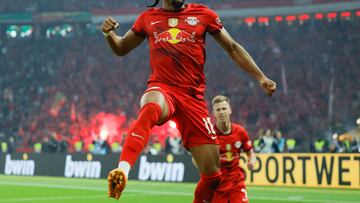 Leipzig's French forward Christopher Nkunku celebrates scoring during the German Cup (DFB Pokal) final football match RB Leipzig v Eintracht Frankfurt in Berlin, Germany, on June 3, 2023. (Photo by Odd ANDERSEN / AFP) / DFB REGULATIONS PROHIBIT ANY USE OF PHOTOGRAPHS AS IMAGE SEQUENCES AND QUASI-VIDEO.