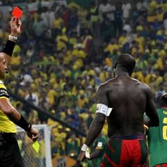 What happens in soccer if the goalkeeper gets a red card?