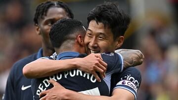 Tottenham Hotspur's South Korean striker #07 Son Heung-Min (R) celebrates with Tottenham Hotspur's Spanish defender #23 Pedro Porro (C) after scoring their fifth goal during the English Premier League football match between Burnley and Tottenham Hotspur at Turf Moor in Burnley, north-west England on September 2, 2023. (Photo by Paul ELLIS / AFP) / RESTRICTED TO EDITORIAL USE. No use with unauthorized audio, video, data, fixture lists, club/league logos or 'live' services. Online in-match use limited to 120 images. An additional 40 images may be used in extra time. No video emulation. Social media in-match use limited to 120 images. An additional 40 images may be used in extra time. No use in betting publications, games or single club/league/player publications. /