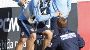 Koke, Raúl García y Griezmann en la sesión vespertina del Atlético.