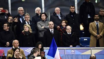 French Education Minister Jean-Michel Blanquer (C) and French president of French football association (FFF) Noel Le Graet (2R) attend the UEFA Euro 2020 Group H qualification football match between France and Iceland at the Stade de France stadium in Sai