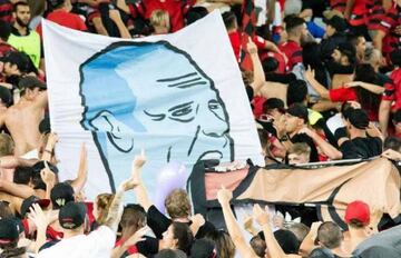 The banner depicting Sydney FC coach Graham Arnold performing oral sex.