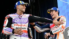 Ducati Spanish rider Jorge Martin (L) and Honda Spanish rider Marc Marquez celebrate on the podium of the sprint race of the MotoGP Valencia Grand Prix at the Ricardo Tormo racetrack in Cheste, on November 25, 2023. (Photo by JAVIER SORIANO / AFP)