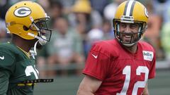 Green Bay Packers quarterback Aaron Rodgers (12) jokes around with cornerback Damarious Randall (23)  Thursday, July 28, 2016 during Green Bay Packers training camp in Green Bay, Wis.  MARK HOFFMAN/MHOFFMAN@JOURNALSENTINEL.COM
