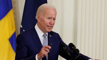 FILE PHOTO: U.S. President Joe Biden delivers remarks and signs documents endorsing Finland's and Sweden's accession to NATO, in the East Room of the White House, in Washington, U.S., August 9, 2022. REUTERS/Evelyn Hockstein/File Photo