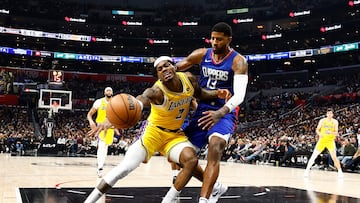 LOS ANGELES, CALIFORNIA - JANUARY 23: Jarred Vanderbilt #2 of the Los Angeles Lakers controls the ball against Paul George #13 of the LA Clippers in the second half at Crypto.com Arena on January 23, 2024 in Los Angeles, California. NOTE TO USER: User expressly acknowledges and agrees that, by downloading and/or using this photograph, user is consenting to the terms and conditions of the Getty Images License Agreement.   Ronald Martinez/Getty Images/AFP (Photo by RONALD MARTINEZ / GETTY IMAGES NORTH AMERICA / Getty Images via AFP)