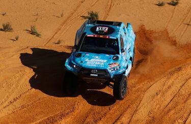 Romain Dumas y Max Delfino.