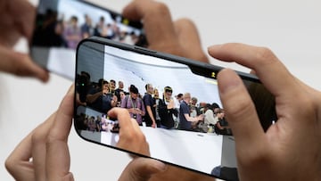 Attendees try the new iPhone 16 as Apple holds an event at the Steve Jobs Theater on its campus in Cupertino, California, U.S. September 9, 2024. REUTERS/Manuel Orbegozo