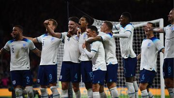 England's midfielder Jude Bellingham (C) celebrates scoring the team's second goal with teammates during the international friendly football match between Scotland and England, at Hampden Park in Glasgow, on September 12, 2023. The match is also the 150th Anniversary Heritage football match, commemorating the 150th anniversary of the first meeting between the two teams, on 30 November 1872. (Photo by ANDY BUCHANAN / AFP)