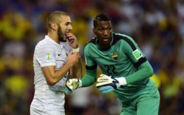 Alexander Dominguez y Karim Benzema.