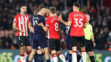 SOUTHAMPTON, ENGLAND - JANUARY 22: Jack Grealish of Manchester City and James Ward-Prowse of Southampton clash during the Premier League match between Southampton and Manchester City at St Mary&#039;s Stadium on January 22, 2022 in Southampton, England. (