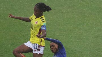 GOA, INDIA - OCTOBER 22: Violeth Mwamakamba of Tanzania
tackles Linda Caicedo of Colombia during the FIFA U-17 Women's World Cup 2022 Quarter Final match between Colombia and Tanzania at Pandit Jawaharlal Nehru Stadium on October 22, 2022 in Goa, India. (Photo by Matthew Lewis - FIFA/FIFA via Getty Images)