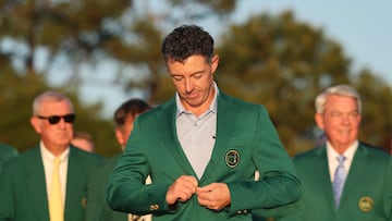 AUGUSTA, GEORGIA - APRIL 12: Rory McIlroy of Northern Ireland reacts after being awarded the Green Jacket during the Green Jacket Ceremony after winning the final round of the 2026 Masters Tournament at Augusta National Golf Club on April 12, 2026 in Augusta, Georgia. Hector Vivas/Getty Images/AFP (Photo by Hector Vivas / GETTY IMAGES NORTH AMERICA / Getty Images via AFP)