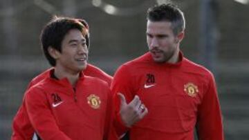 Kagawa, con Van Persie.