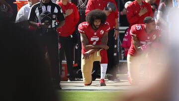 Colin Kaepernick kneels for the national anthem before a game last October in Santa Clara, Calif.