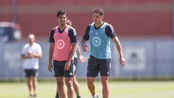 ST PAUL, MN - AUGUST 09: Carlos Vela and Javier Hernandez talk during a training session ahead of the MLS All Stars and Liga MX All Stars game at National Sports Center on August 9, 2022 in St Paul, Minnesota. (Photo by Omar Vega/Getty Images)