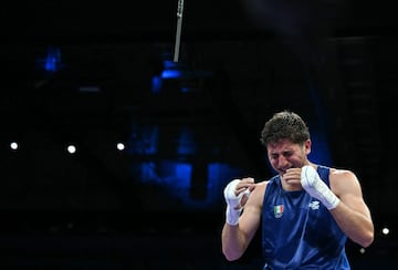 Mexico's Marco Alonso Verde Alvarez celebrates his victory over India's Nishant Dev in the men's 57kg quarter-final boxing match during the Paris 2024 Olympic Games at the North Paris Arena, in Villepinte on August 3, 2024. (Photo by MOHD RASFAN / AFP)