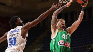 Panathinaikos' Juancho Hernangomez (R) in action against Maccabi's Trevion Williams (L) during the Euroleague basketball match between Maccabi Tel Aviv and Panathinaikos Athens in Belgrade, Serbia, 26 March 2025.
