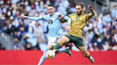 VIGO, SPAIN - MARCH 20: Christian Pezzella of Real Betis being followed by Iago Aspas of Celta de Vigo during the LaLiga Santander match between RC Celta de Vigo and Real Betis at Abanca-Bala&iacute;dos on March 20, 2022 in Vigo, Spain. (Photo by Juan Man