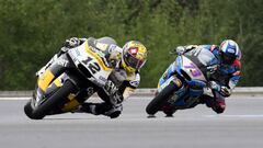 Thomas Luthi (L) of Switzerland and Alex Marquez of Spain compete during the Moto2 event of the Grand Prix of the Czech Republic in Brno on August 6, 2017. / AFP PHOTO / Michal Cizek