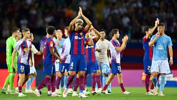 Barcelona's Uruguayan defender #04 Ronald Araujo and teammates react at the end of the Spanish Liga football match between FC Barcelona and RC Celta de Vigo at the Estadi Olimpic Lluis Companys in Barcelona on September 23, 2023. (Photo by Pau BARRENA / AFP)