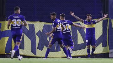 BUENOS AIRES, ARGENTINA - APRIL 27: Carlos Tevez of Boca Juniors celebrates with teammates after scoring the opening goal during a match between Boca Juniors and Santos as part of Group C of Copa CONMEBOL Libertadores 2021 at Estadio Alberto J. Armando on