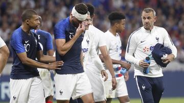 France's Olivier Giroud injured during a friendly soccer match between France and USA at the Groupama stadium in Decines, near Lyon, central France, Saturday, June 9, 2018. (AP Photo/Laurent Cipriani)