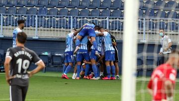 Los jugadores del M&aacute;laga celebraron as&iacute; el 1-0, obra de Juanpi.