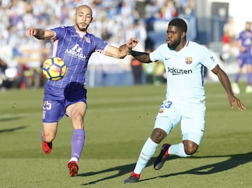 Amrabat con Umtiti. 