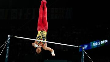 Colombia's Angel Barajas competes in the horizontal bar event of the artistic gymnastics men's qualification during the Paris 2024 Olympic Games at the Bercy Arena in Paris, on July 27, 2024. (Photo by Paul ELLIS / AFP) (Photo by PAUL ELLIS/AFP via Getty Images)