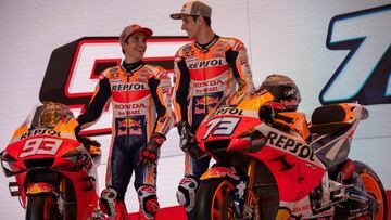MotoGP World Champion Marc Marquez (L) and his brother Alex Marquez (R), Moto2 champion, attend the Repsol Honda Team's official presentation for the upcoming 2020 Motorcyle Grand Prix season in Jakarta on February 4, 2020. - Alex Marquez was announced as the successor to retired Jorge Lorenzo to team up with his older brother and reigning top-class world champion Marc. (Photo by BAY ISMOYO / AFP)