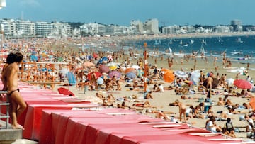 Gran Canaria, full beach during summer day with the sea and hotels in sight.Scan from photo - 1981