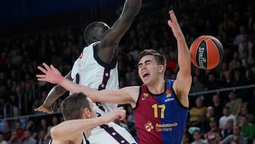 Juan Núñez ante Ousmane Diop durante el partido de Euroliga de la jornada 15 que han disputado este viernes en el Palau Blaugrana.