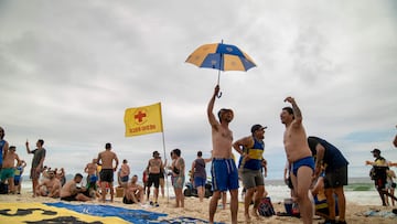 Fans of Argentina�s Boca Juniors enjoy Copacabana beach in Rio de Janeiro, Brazil, on November 2, 2023, ahead of the Copa Libertadoreas final match against Fluminense next November 4. (Photo by Carlos Fabal / AFP)