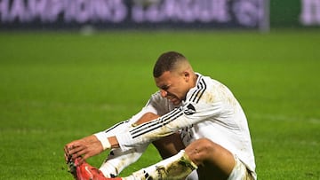 Real Madrid's French forward #09 Kylian Mbappe reacts in pain during the UEFA Champions League, league phase - matchday 8 between Stade Brestois 29 (Brest) and Real Madrid CF at the Roudourou Stadium in Guingamp, north-western France, on January 29, 2025. (Photo by Damien MEYER / AFP)